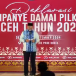 Pj Gubernur Aceh Safrizal ZA menyampaikan sambutan saat Deklarasi Kampanye Damai Pilkada di Ballroom The Pade Hotel, Aceh Besar pada Selasa malam, 24 September 2024. Foto: Humas KIP Aceh