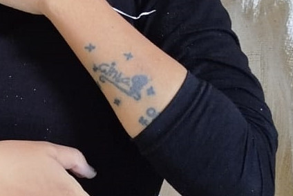 Tato di tangan Cinta