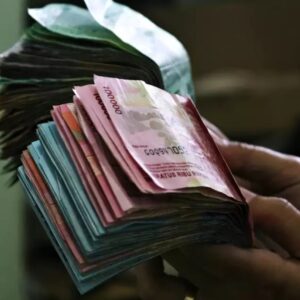 Ilustrasi uang dan harta benda yang menjadi sarana ibadah zakat dan sedekah dalam pandangan ekonomi Islam